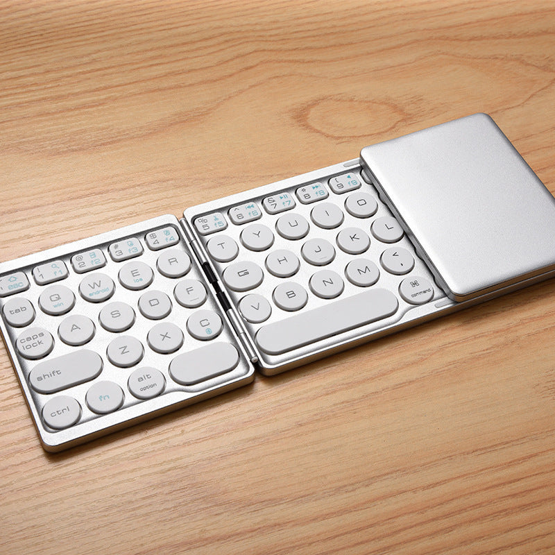 Three-fold wireless computer keyboard